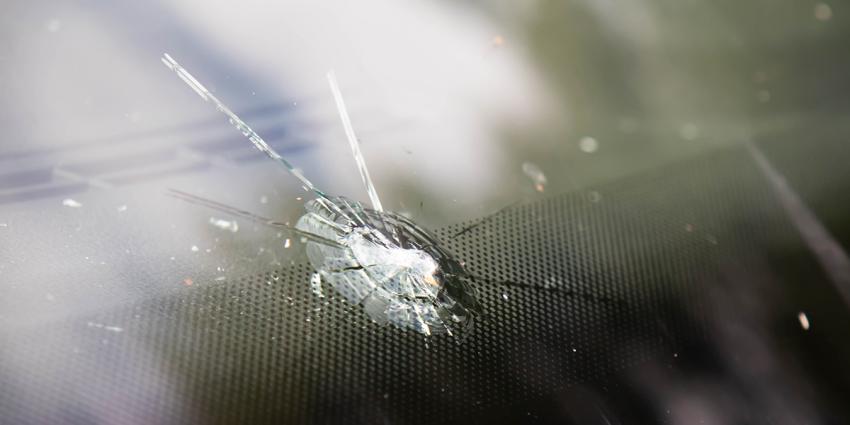 A rock caused a chip in a vehicle's windshield